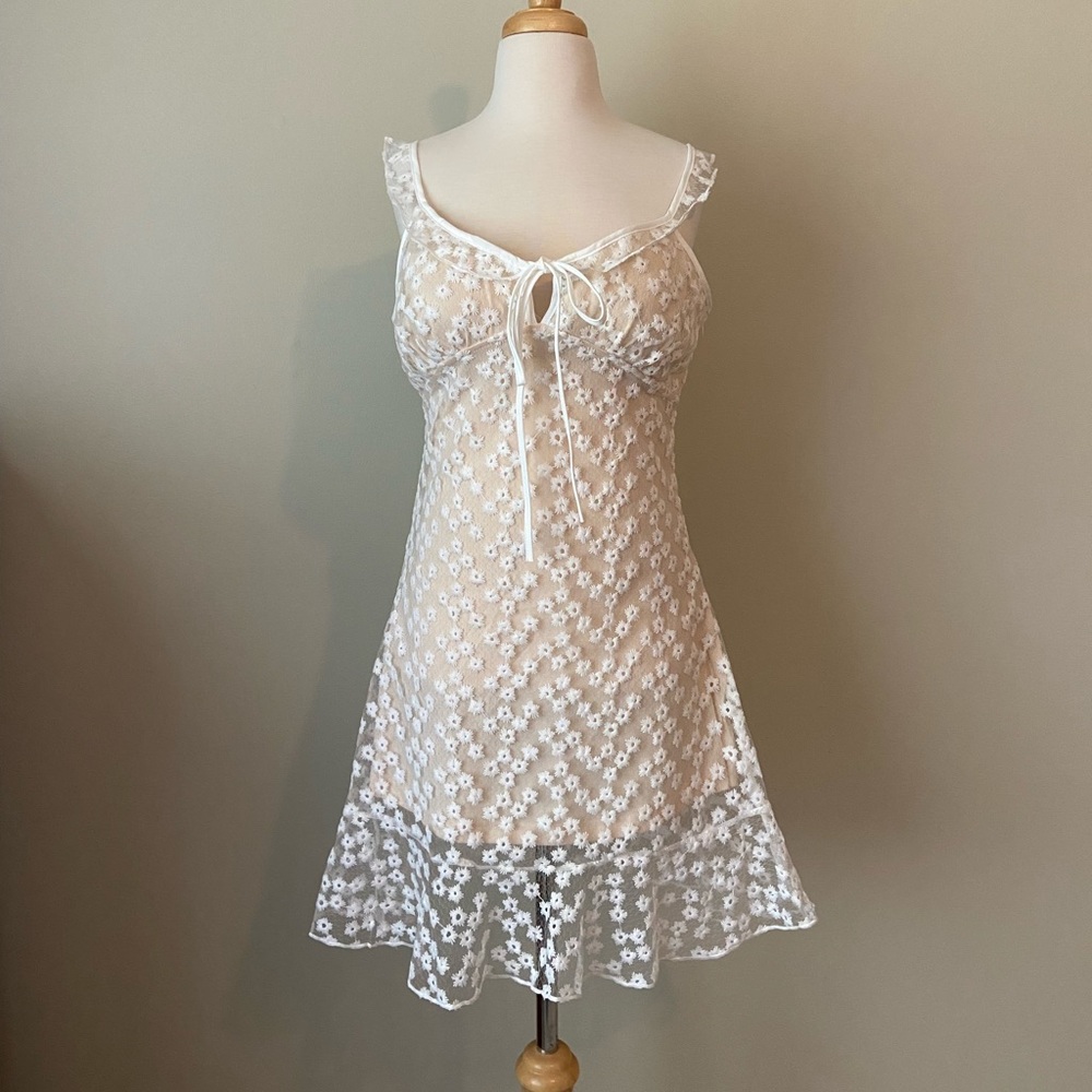 white floral mini dress with tan underdress